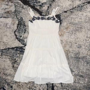 white and blue floral detail dress